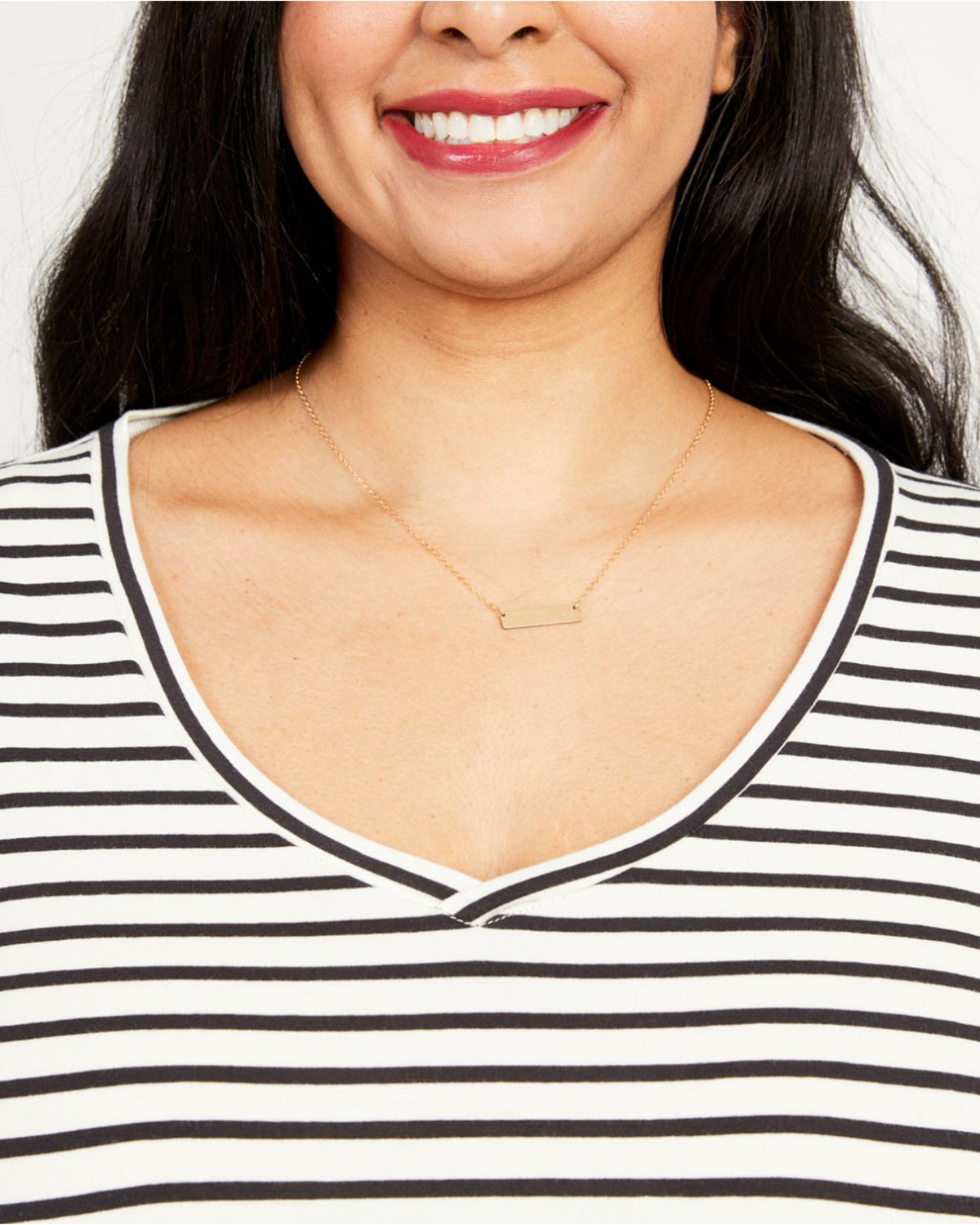 Cashmerette Concord T-Shirt PDF sewing pattern, woman wearing a gold necklace with a white and black striped shirt