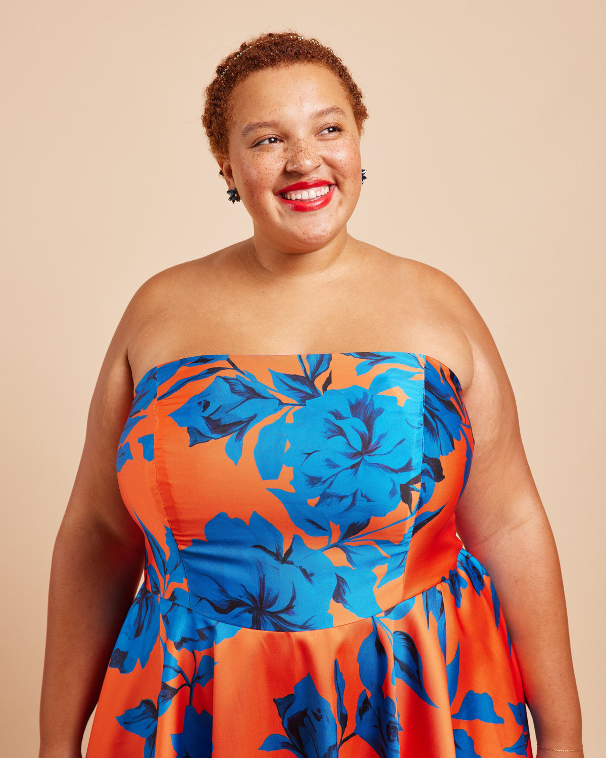 Cashmerette Ellington Dress PDF sewing pattern, woman wearing a strapless dress with blue floral pattern