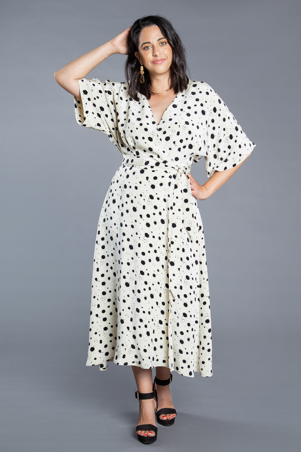 Model in a black and white print maxi dress sewn from the Closet Core Elodie Wrap Dress PDF sewing pattern, sizes 0-20 and 14-32