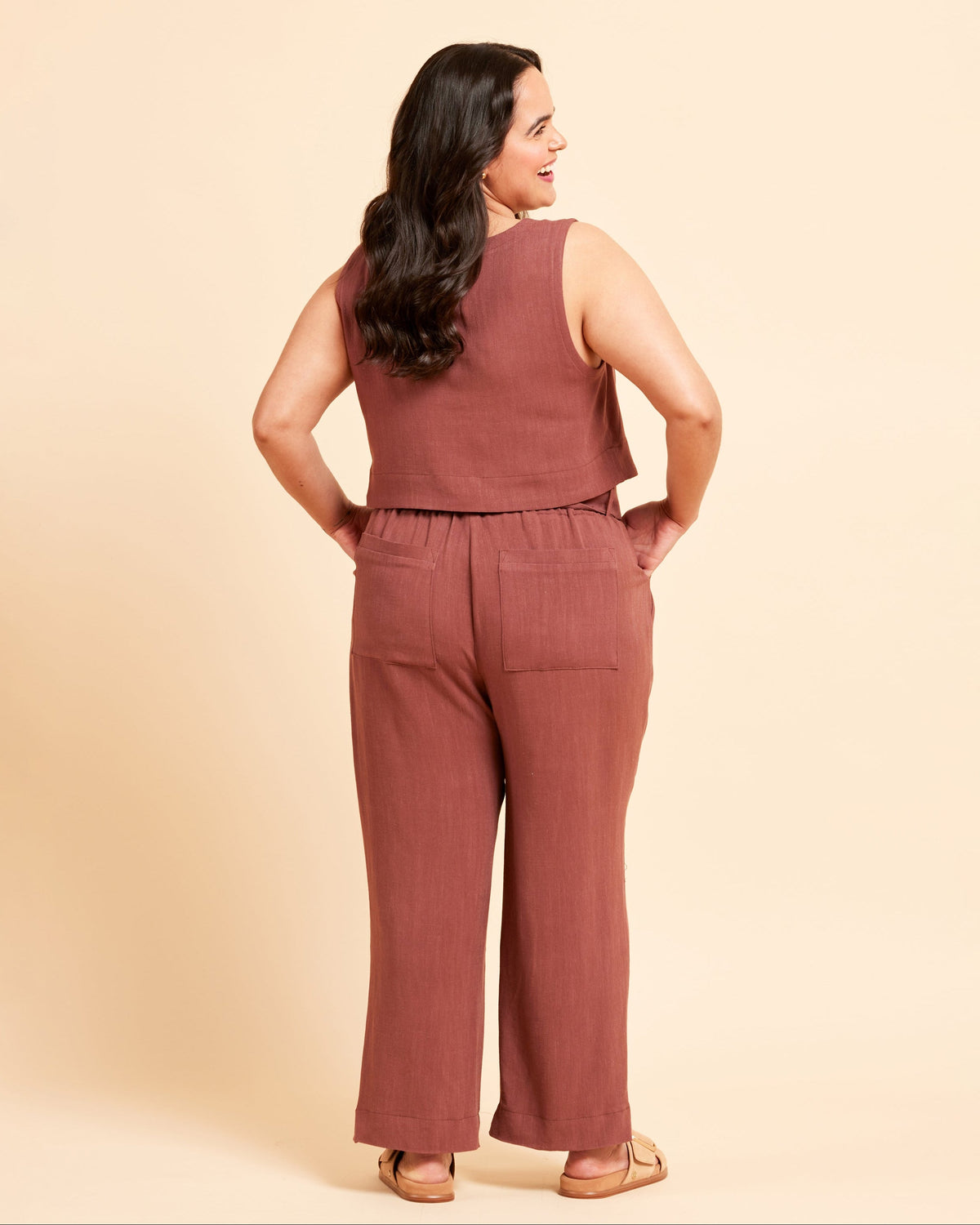 Cashmerette Everett Pants and Shorts PDF sewing pattern, woman wearing a brown sleeveless top and pants, back view