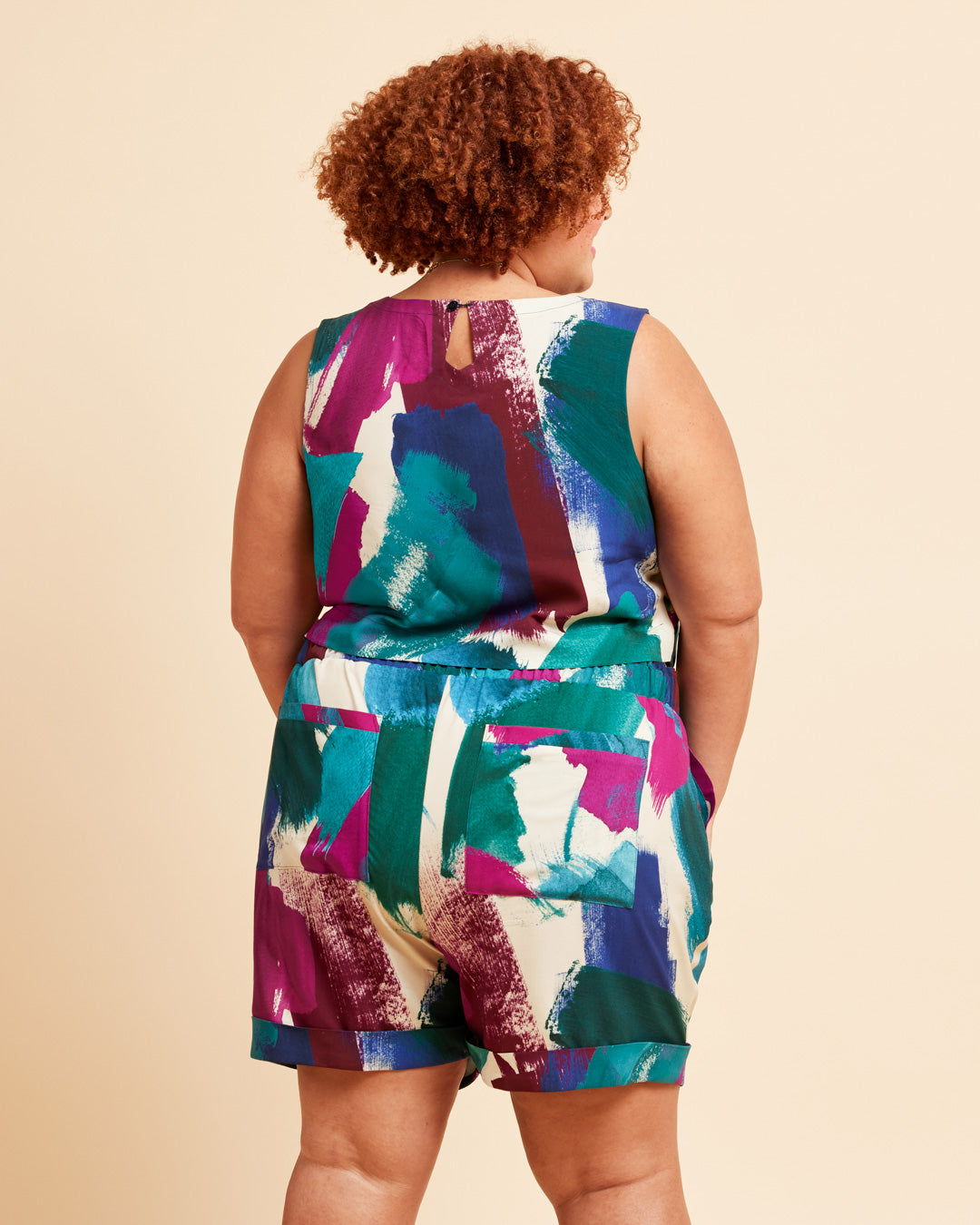 Cashmerette Everett Pants and Shorts PDF sewing pattern, person wearing a colorful sleeveless top and shorts set