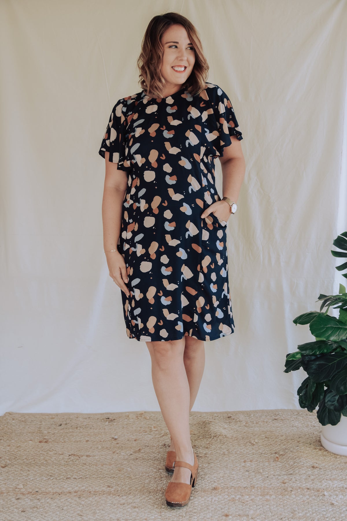 Sew to Grow Frankie Shift and Top PDF sewing pattern, model in a navy floral shift dress