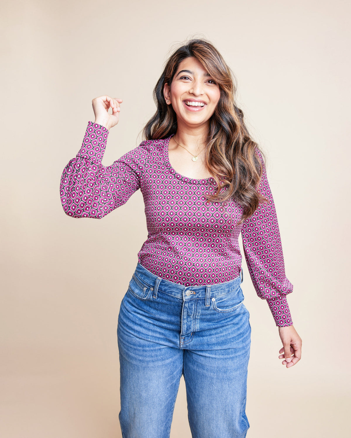 Cashmerette Grafton Dress, Top and Skirt PDF sewing pattern, woman wearing a patterned pink long-sleeve top and blue jeans