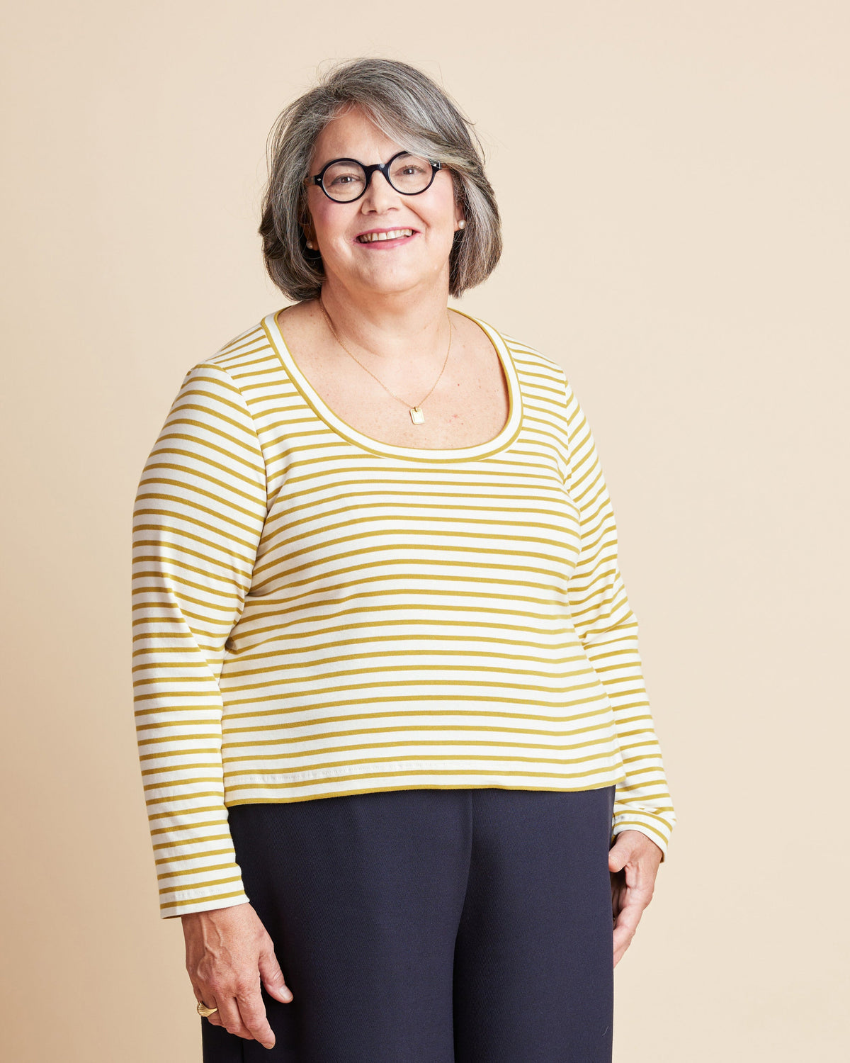 Cashmerette Grafton Dress, Top and Skirt PDF sewing pattern, woman wearing a yellow and white striped shirt, smiling