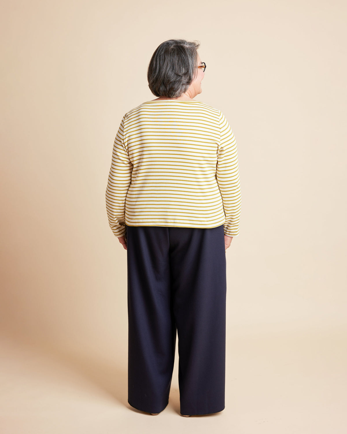 Cashmerette Grafton Dress, Top and Skirt PDF sewing pattern, person wearing a yellow striped shirt and navy pants
