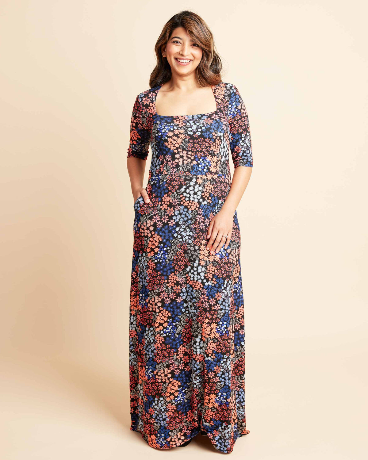 Cashmerette Grafton Dress, Top and Skirt PDF sewing pattern, woman wearing a floral dress, three quarter view
