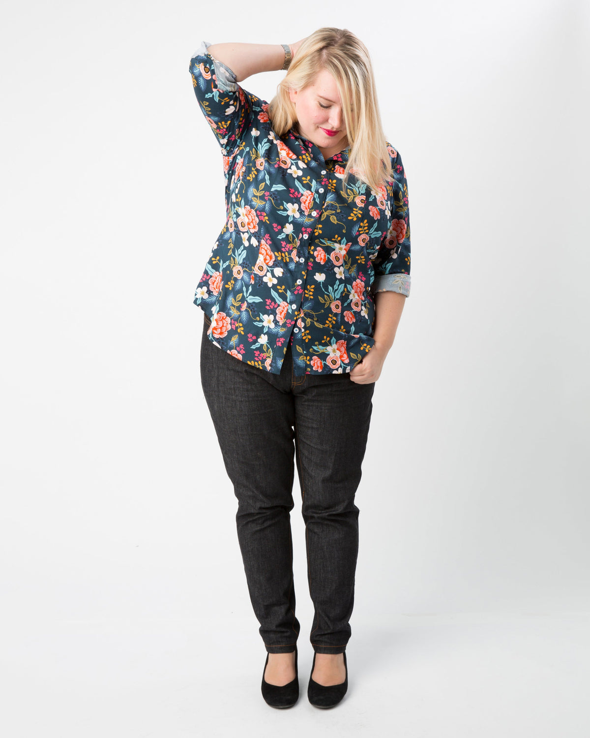 Cashmerette Harrison Shirt PDF sewing pattern, woman wearing a floral blouse and black pants, three quarter view