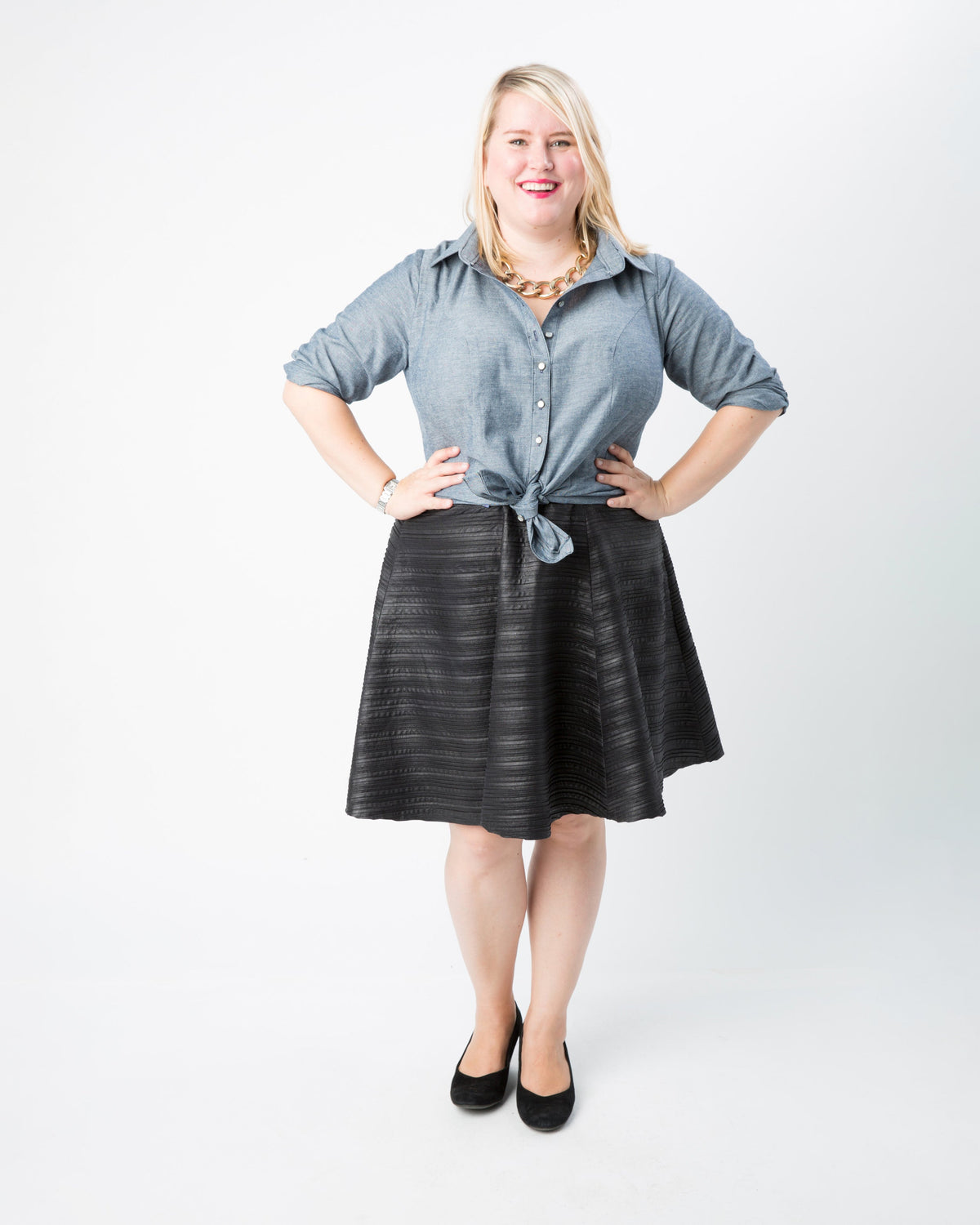 Cashmerette Harrison Shirt PDF sewing pattern, woman wearing a blue shirt and black skirt