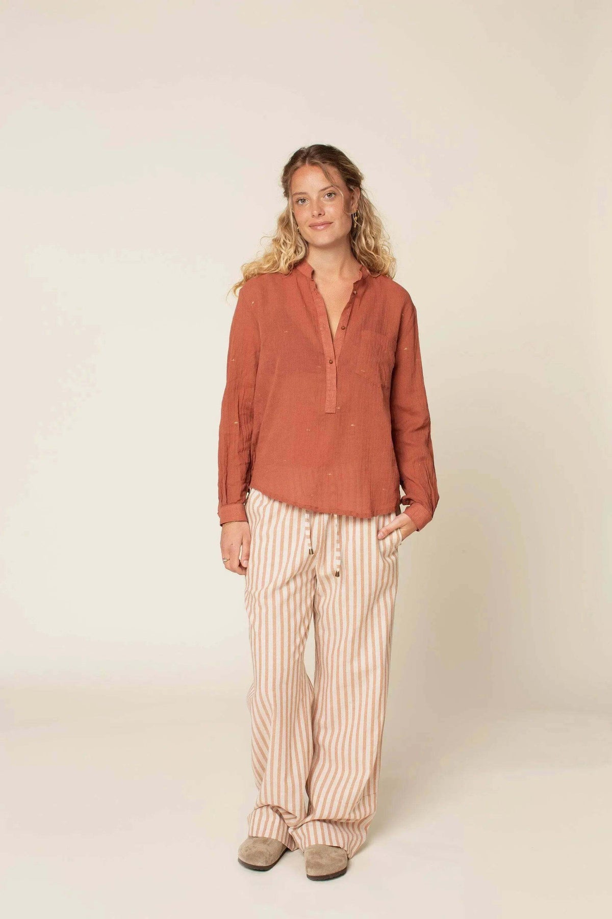 Wardrobe By Me High Waist Pants PDF sewing pattern, model in an orange top