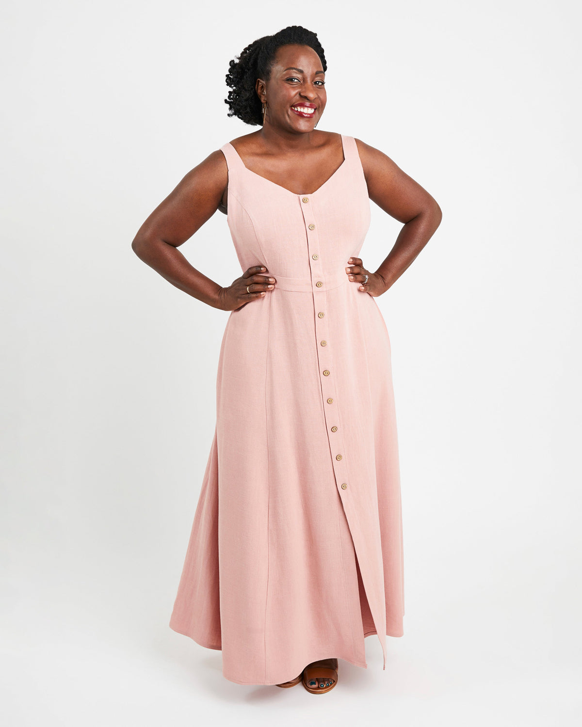 Cashmerette Holyoke Maxi Dress and Skirt PDF sewing pattern, woman wearing a pink sleeveless dress with buttons, front view