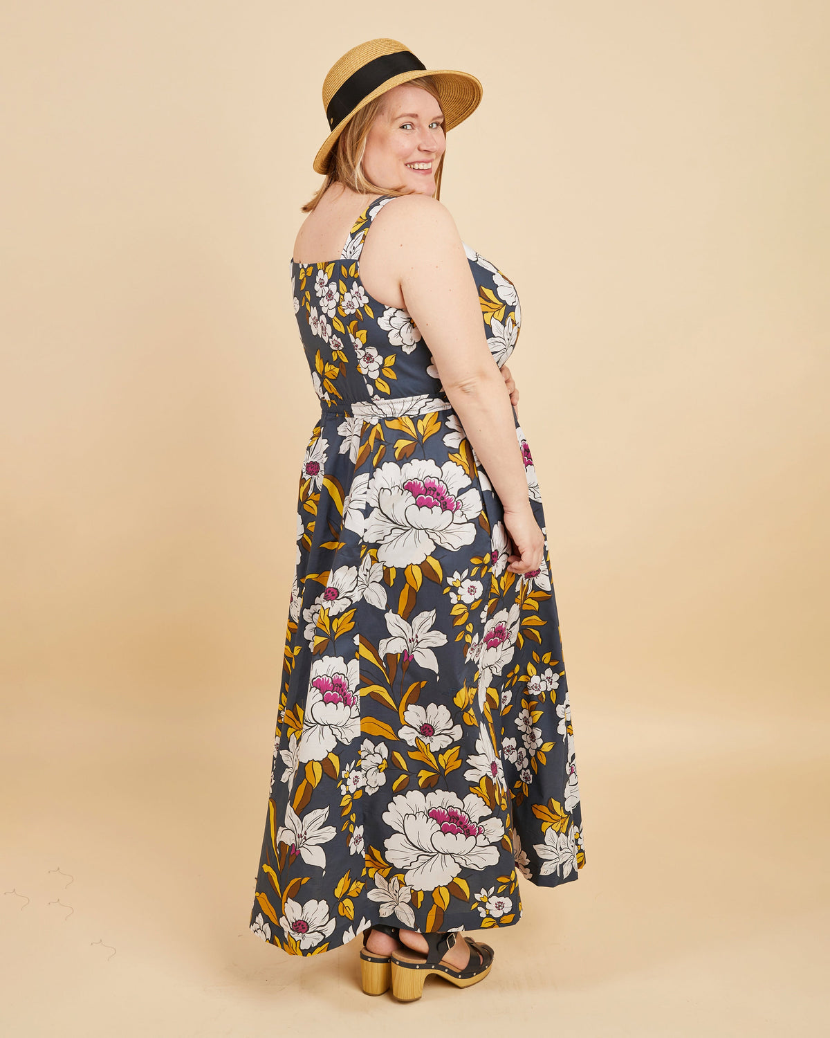 Cashmerette Holyoke Maxi Dress and Skirt PDF sewing pattern, woman wearing a floral dress and straw hat