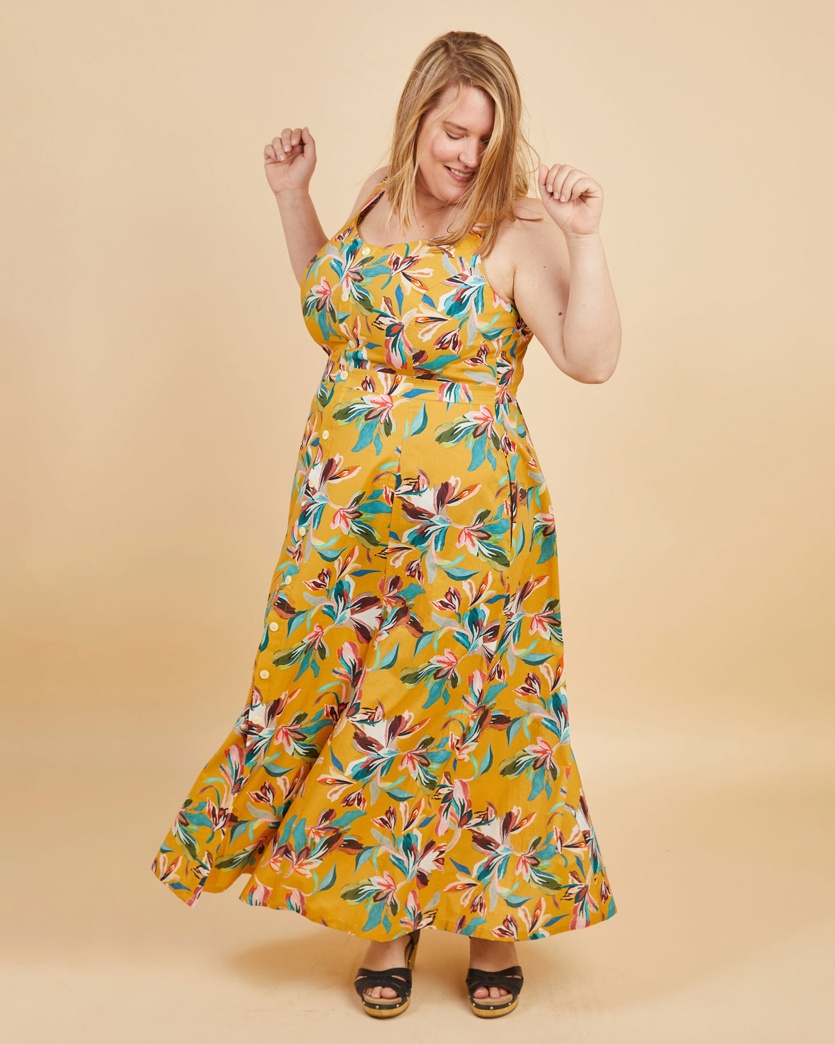 Cashmerette Holyoke Maxi Dress and Skirt PDF sewing pattern, woman wearing a yellow floral dress, side view