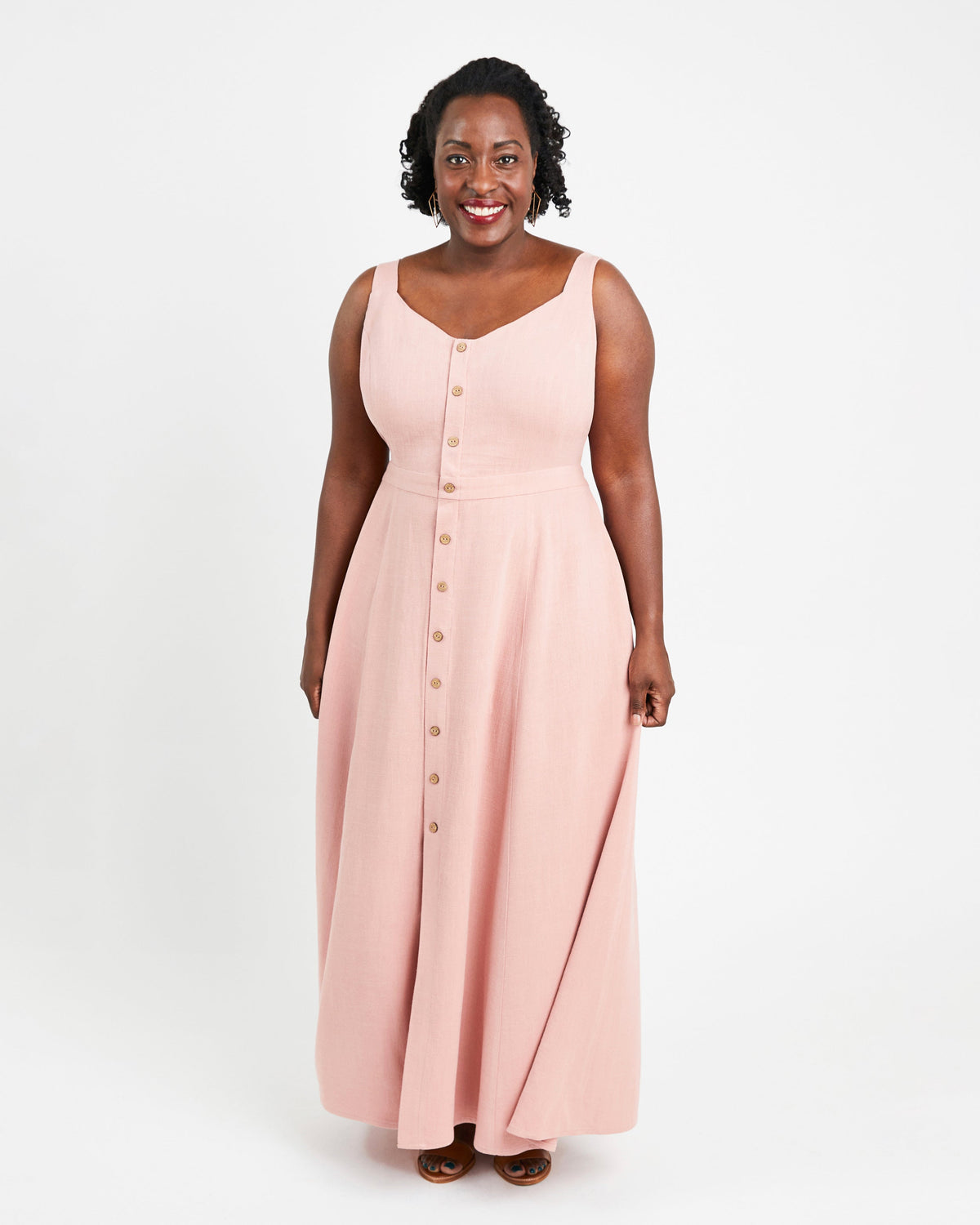 Cashmerette Holyoke Maxi Dress and Skirt PDF sewing pattern, woman wearing a pink sleeveless dress with buttons, three quarter view