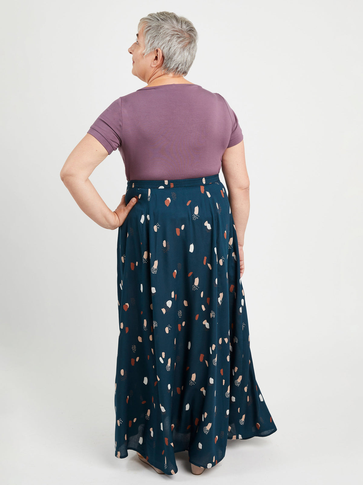 Cashmerette Holyoke Maxi Dress and Skirt PDF sewing pattern, woman wearing a purple top and blue patterned skirt