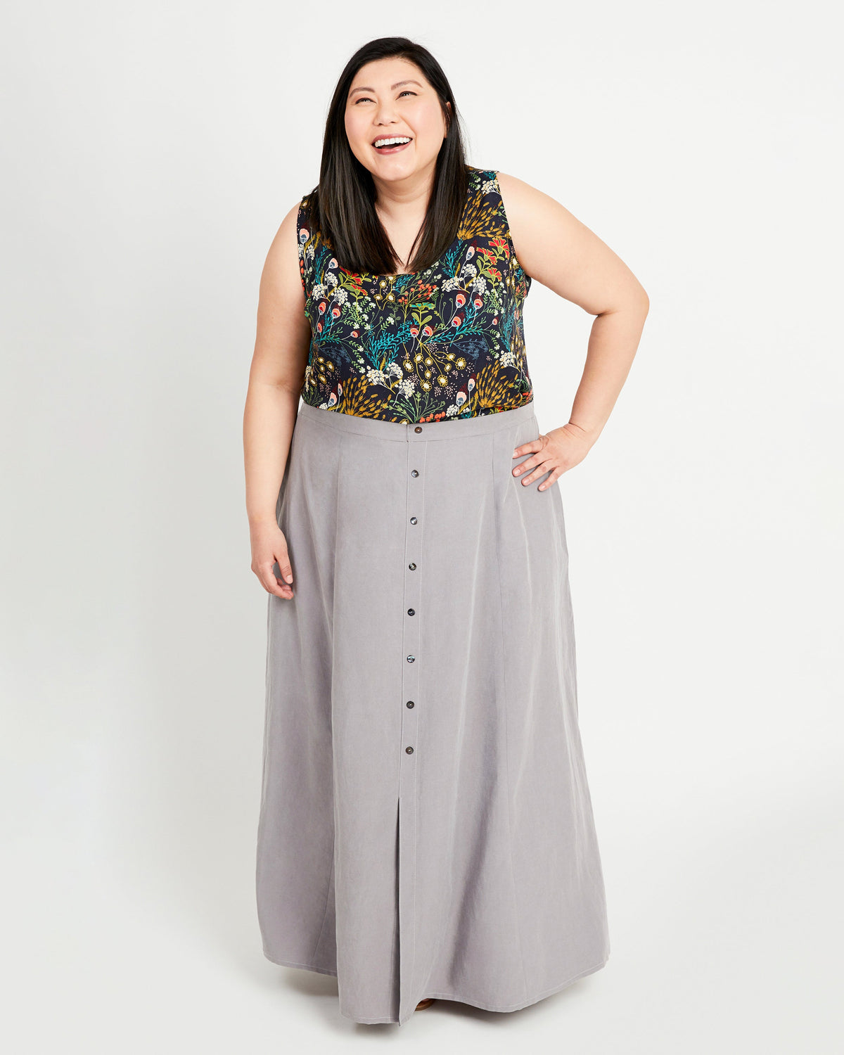Cashmerette Holyoke Maxi Dress and Skirt PDF sewing pattern, woman wearing a floral top and gray skirt, front view