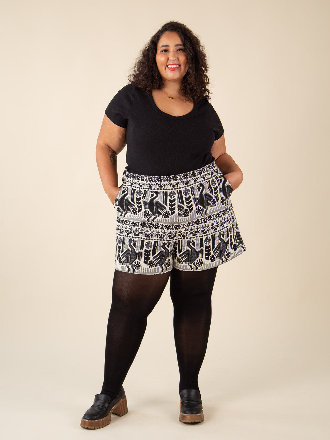 Black and white print short overalls sewn from the Closet Core Jenny Overalls and trousers PDF sewing pattern