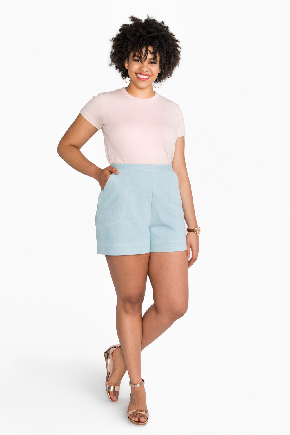 Light blue high waist shorts sewn from the Closet Core Jenny Overalls and trousers PDF sewing pattern