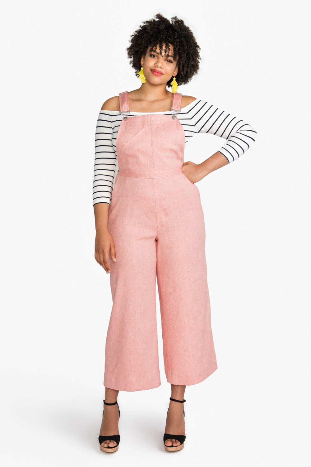 Model in pink cropped Jenny Overalls sewn from the Closet Core Jenny Overalls and trousers PDF sewing pattern, sizes 0-20 and 14-32