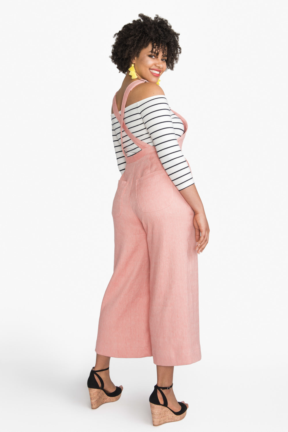 Side view of pink wide leg overalls made with the Closet Core Jenny Overalls and trousers PDF sewing pattern