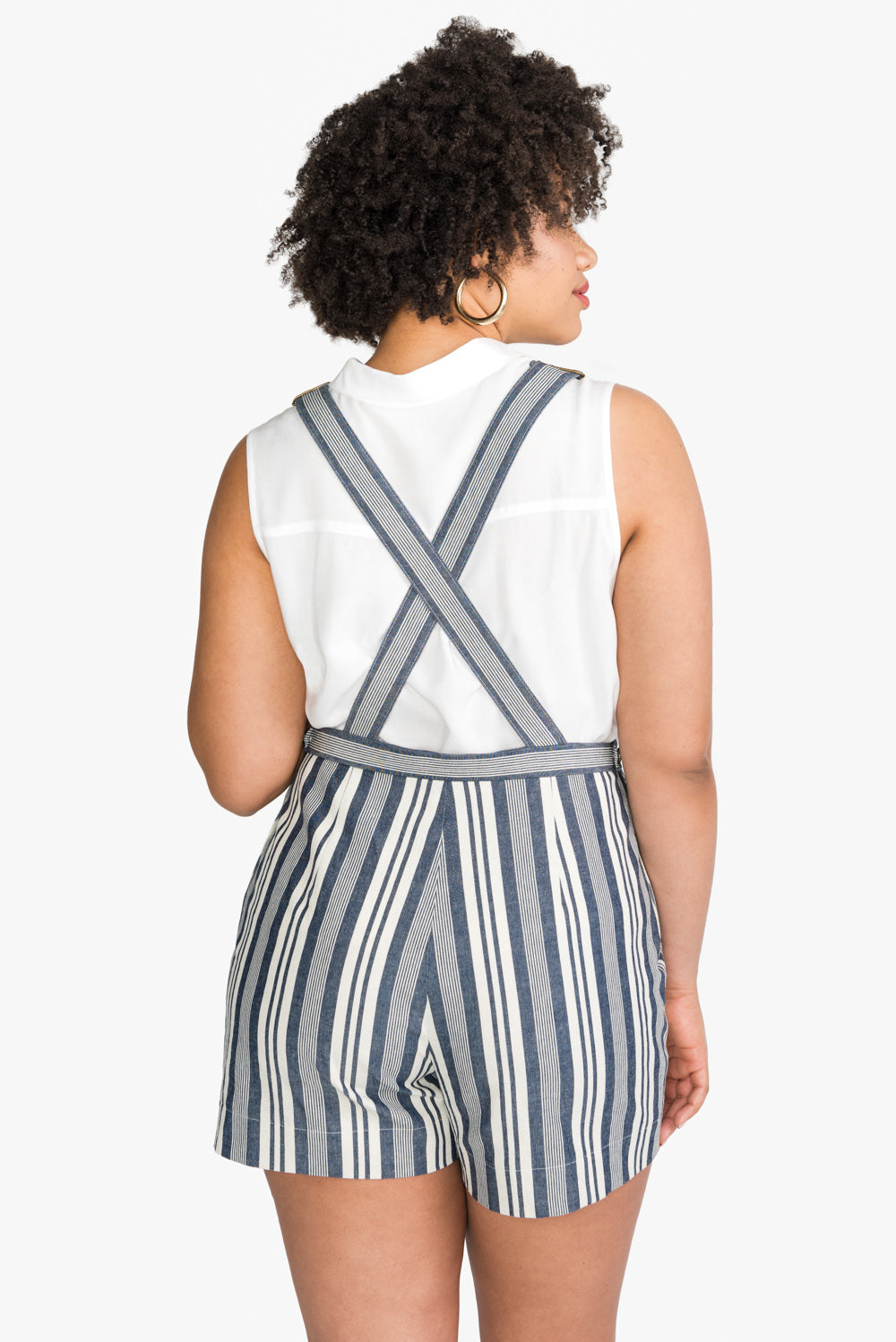 Back view of striped shortalls with crossed straps, Closet Core Jenny Overalls and trousers PDF sewing pattern