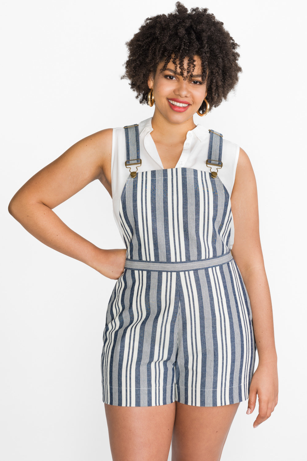 Blue and white striped short overalls sewn from the Closet Core Jenny Overalls and trousers PDF sewing pattern