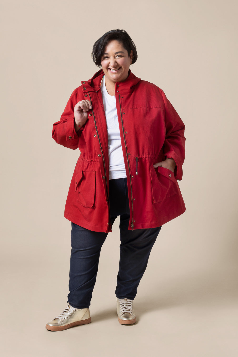Red unlined anorak sewn from the Closet Core Kelly Anorak PDF sewing pattern, three quarter view