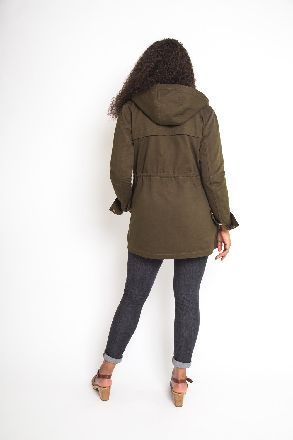 Back view of an olive hooded anorak made with the Closet Core Kelly Anorak PDF sewing pattern