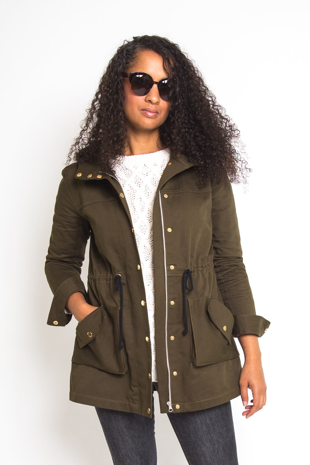 Model in an olive green hooded anorak sewn from the Closet Core Kelly Anorak PDF sewing pattern, sizes 0-20 and 14-32