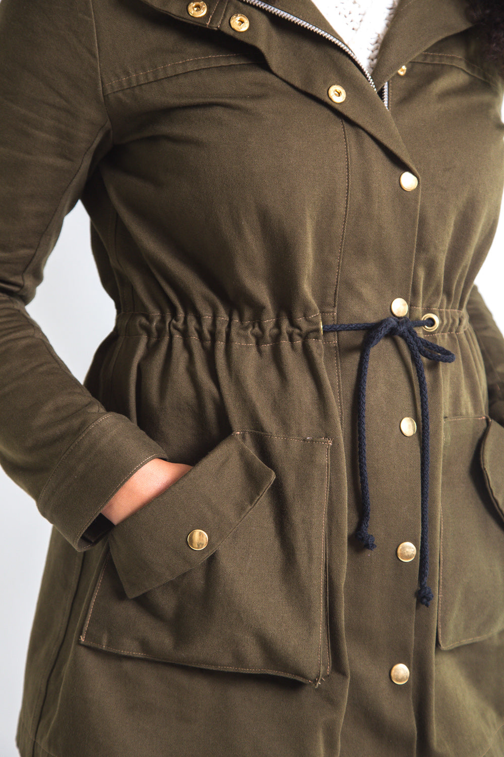 Close-up of the drawstring waist on an olive anorak from the Closet Core Kelly Anorak PDF sewing pattern