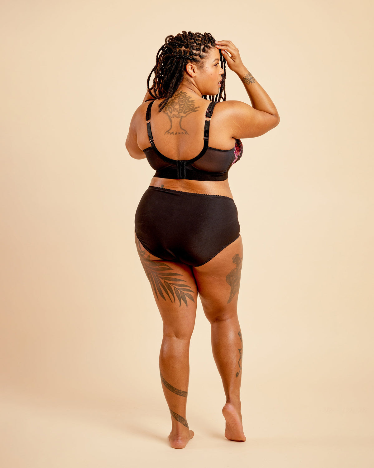 Cashmerette Loftus Bralette PDF sewing pattern, person wearing a black bikini set