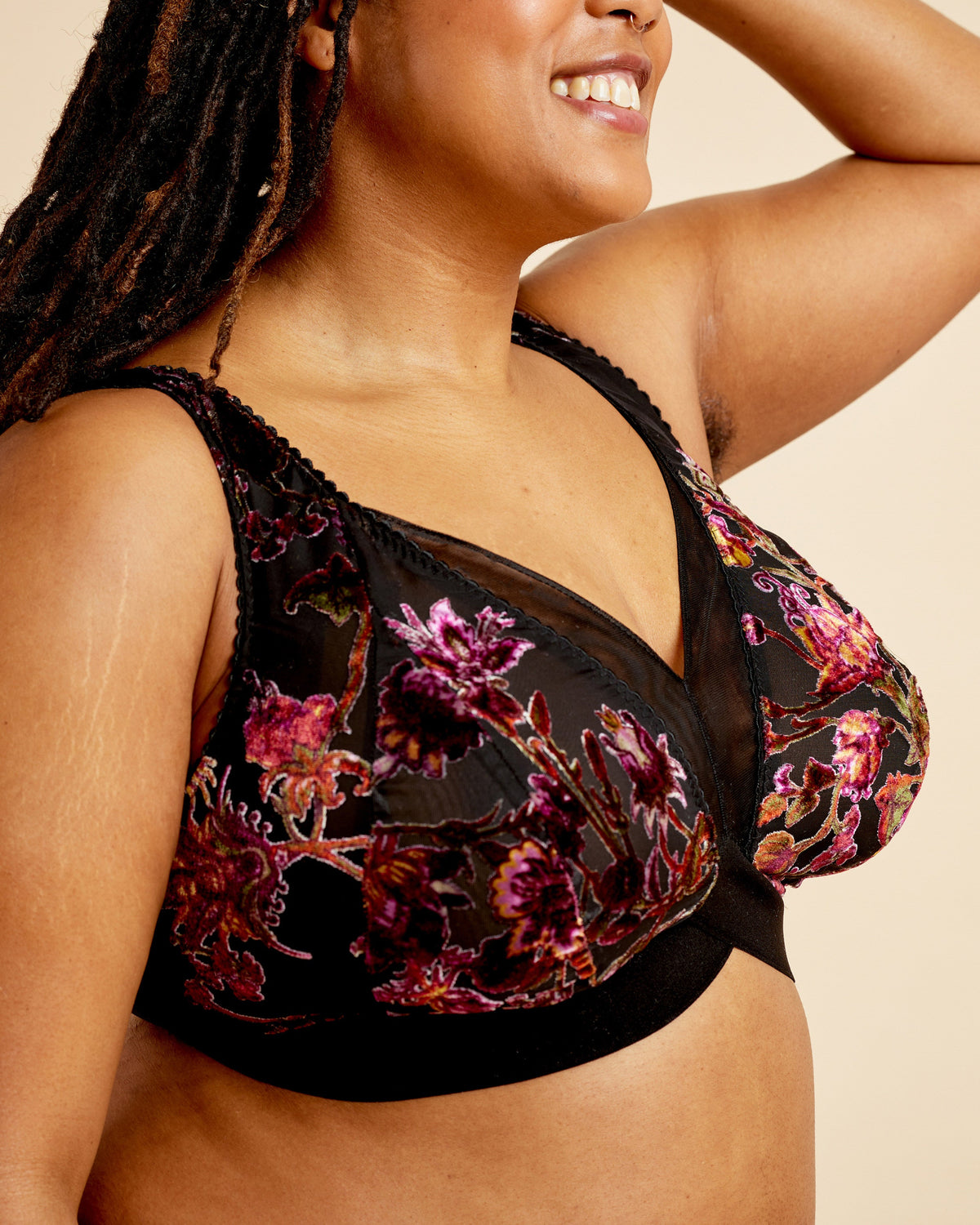 Cashmerette Loftus Bralette PDF sewing pattern, woman wearing a floral black bralette