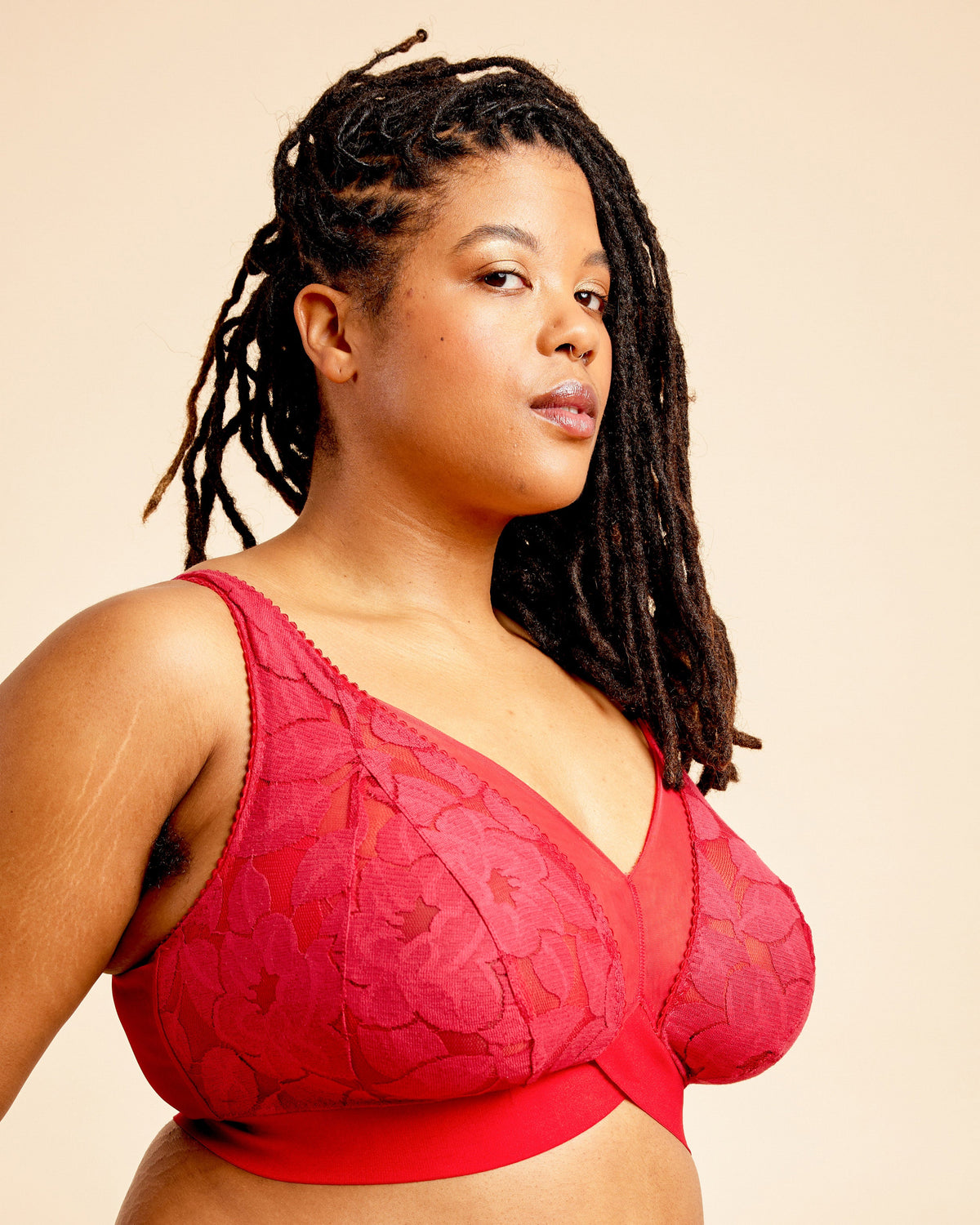 Cashmerette Loftus Bralette PDF sewing pattern, woman wearing a red lace bralette