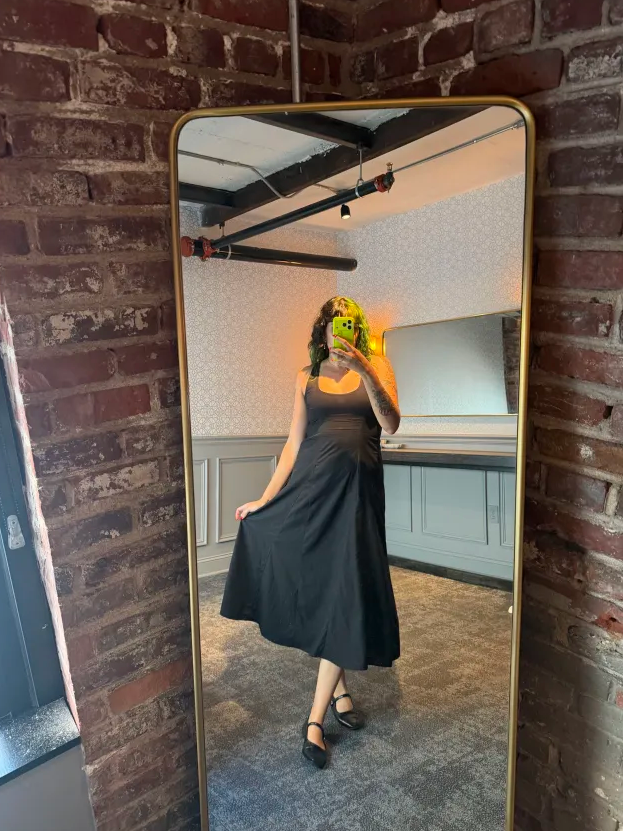 Hey Hey Dorothy Kay Melanie Dress PDF sewing pattern, dark dress in a doorway