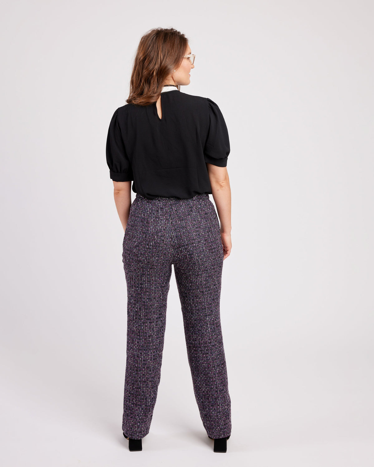 Cashmerette Meriam Trousers PDF sewing pattern, woman wearing a black blouse and patterned pants