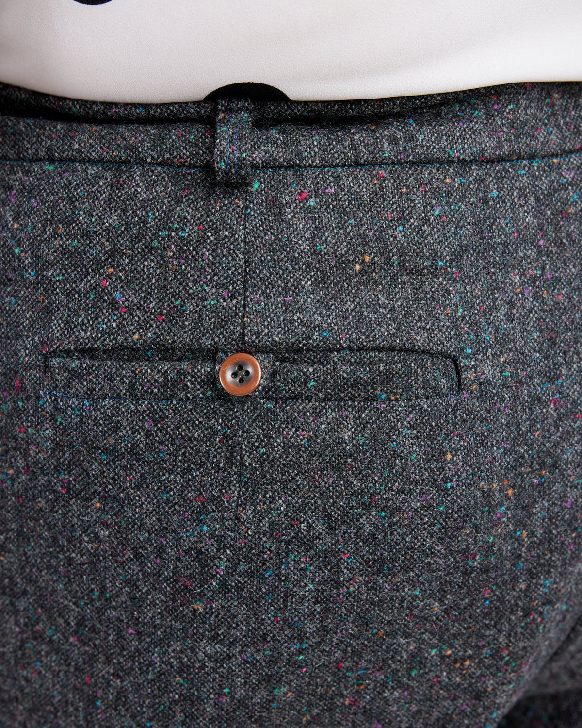 Cashmerette Meriam Trousers PDF sewing pattern, close-up of a gray textured fabric with a button