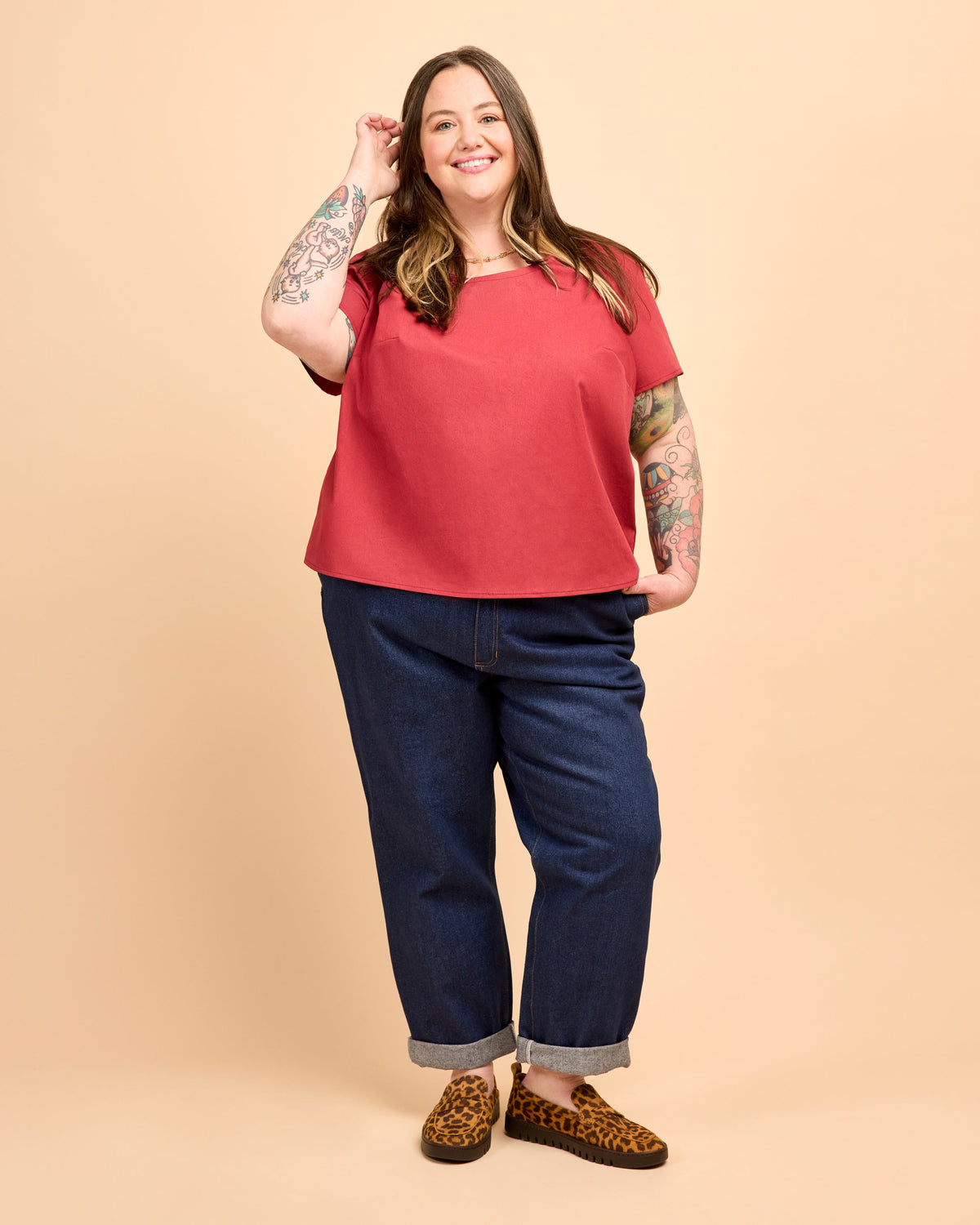 Cashmerette Montrose Top PDF sewing pattern, woman wearing a red top and blue jeans