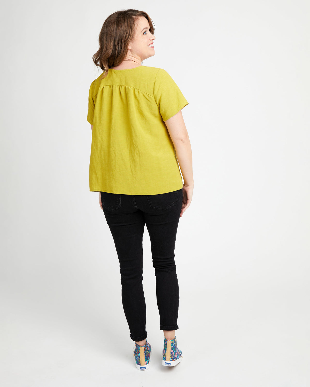Cashmerette Montrose Top PDF sewing pattern, woman wearing a yellow top and black pants