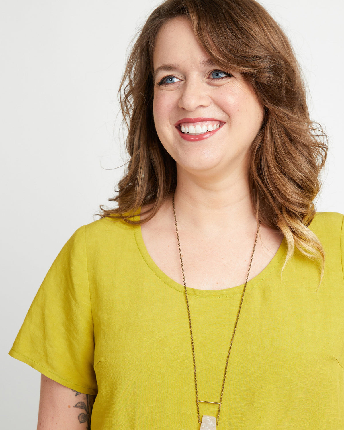 Cashmerette Montrose Top PDF sewing pattern, woman wearing a yellow shirt