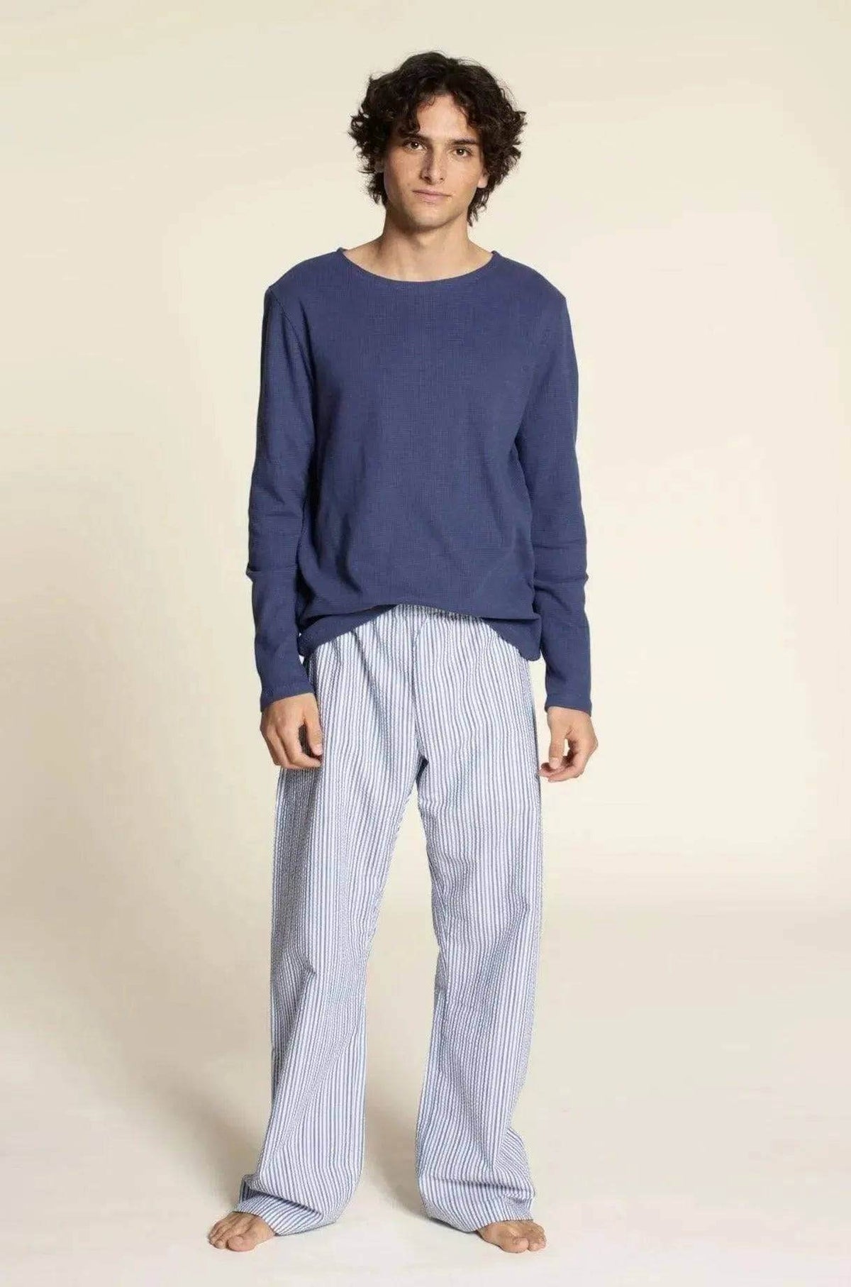 Wardrobe By Me unisex Pajama Pants PDF sewing pattern, model in navy pajama pants