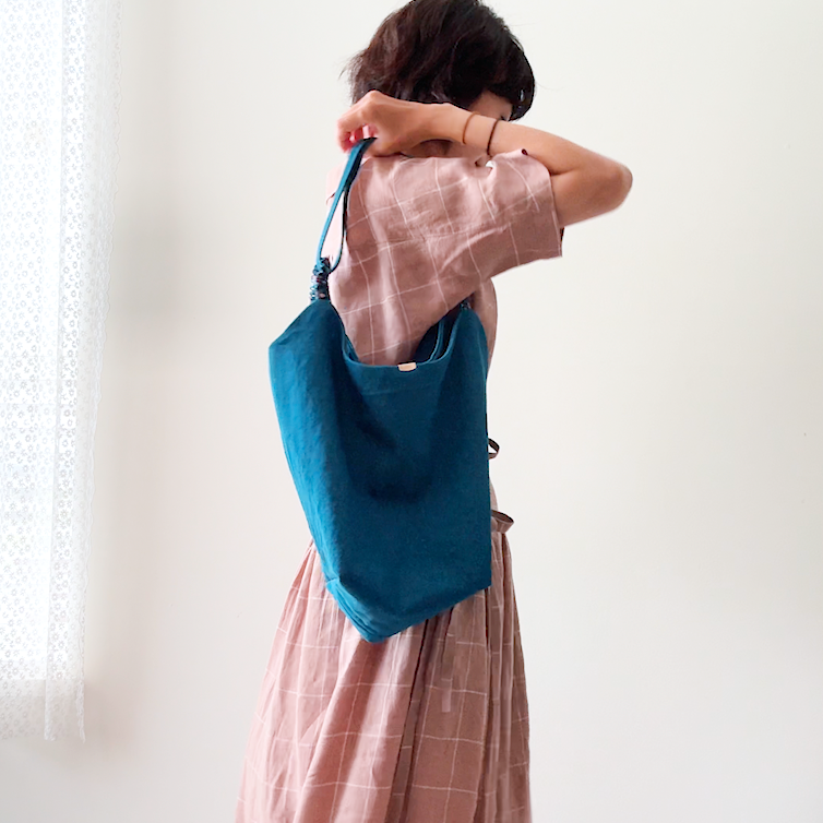 Sewing Therapy Bridge Bag PDF sewing pattern, pink outfit with the bag over the shoulder