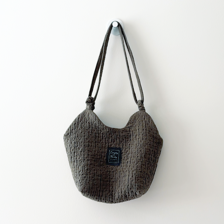 Sewing Therapy Bridge Bag PDF sewing pattern, black bag worn on shoulder