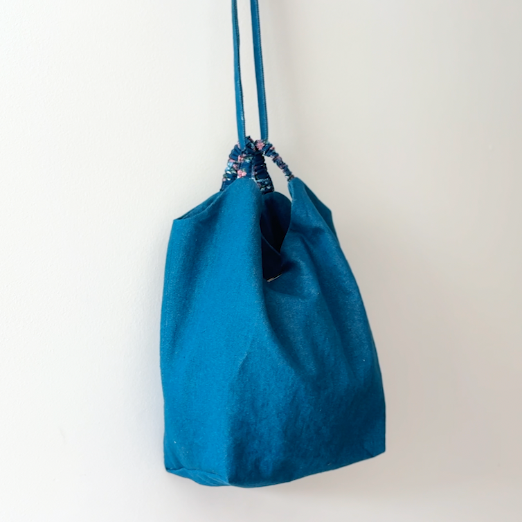 Sewing Therapy Bridge Bag PDF sewing pattern, blue bridge bag hanging