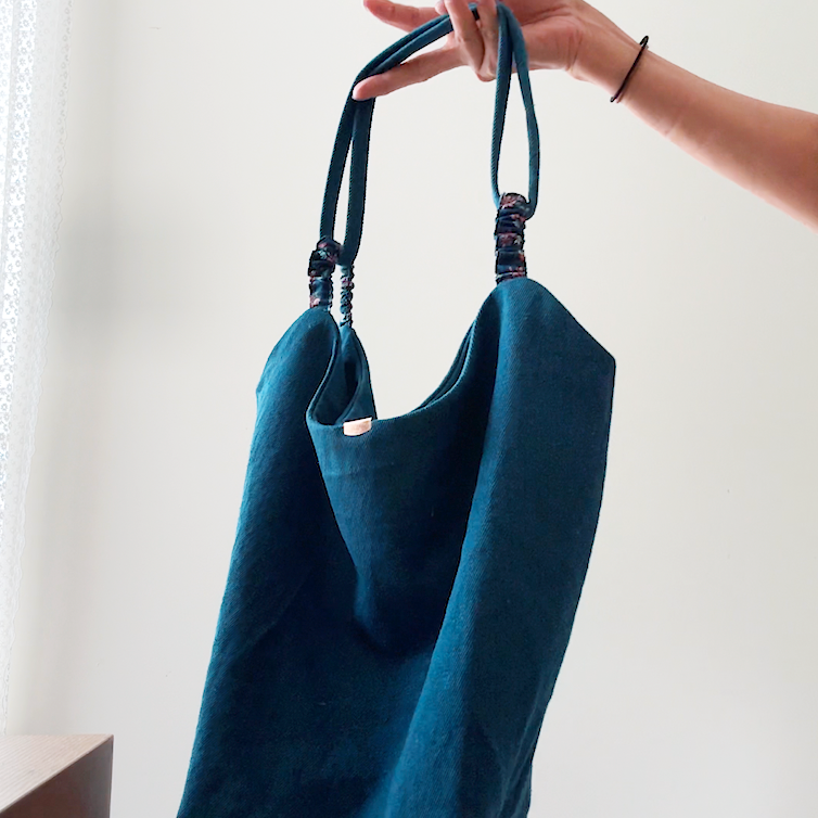 Sewing Therapy Bridge Bag PDF sewing pattern, teal bag carried on the arm