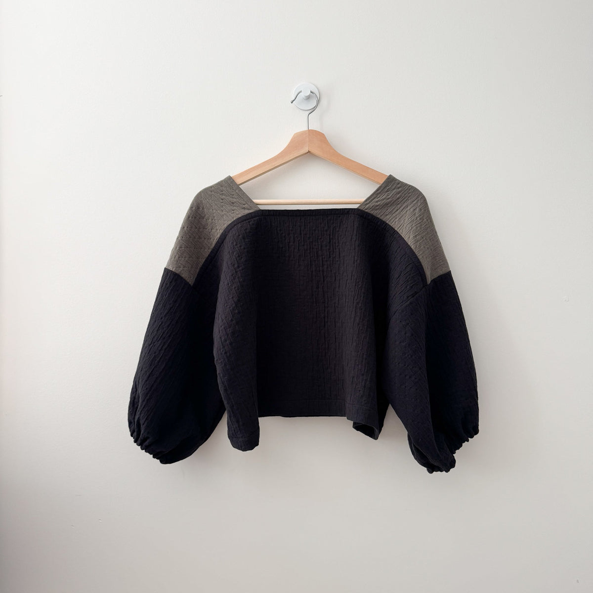 Sewing Therapy Rectangle Top PDF sewing pattern, black top on a hanger
