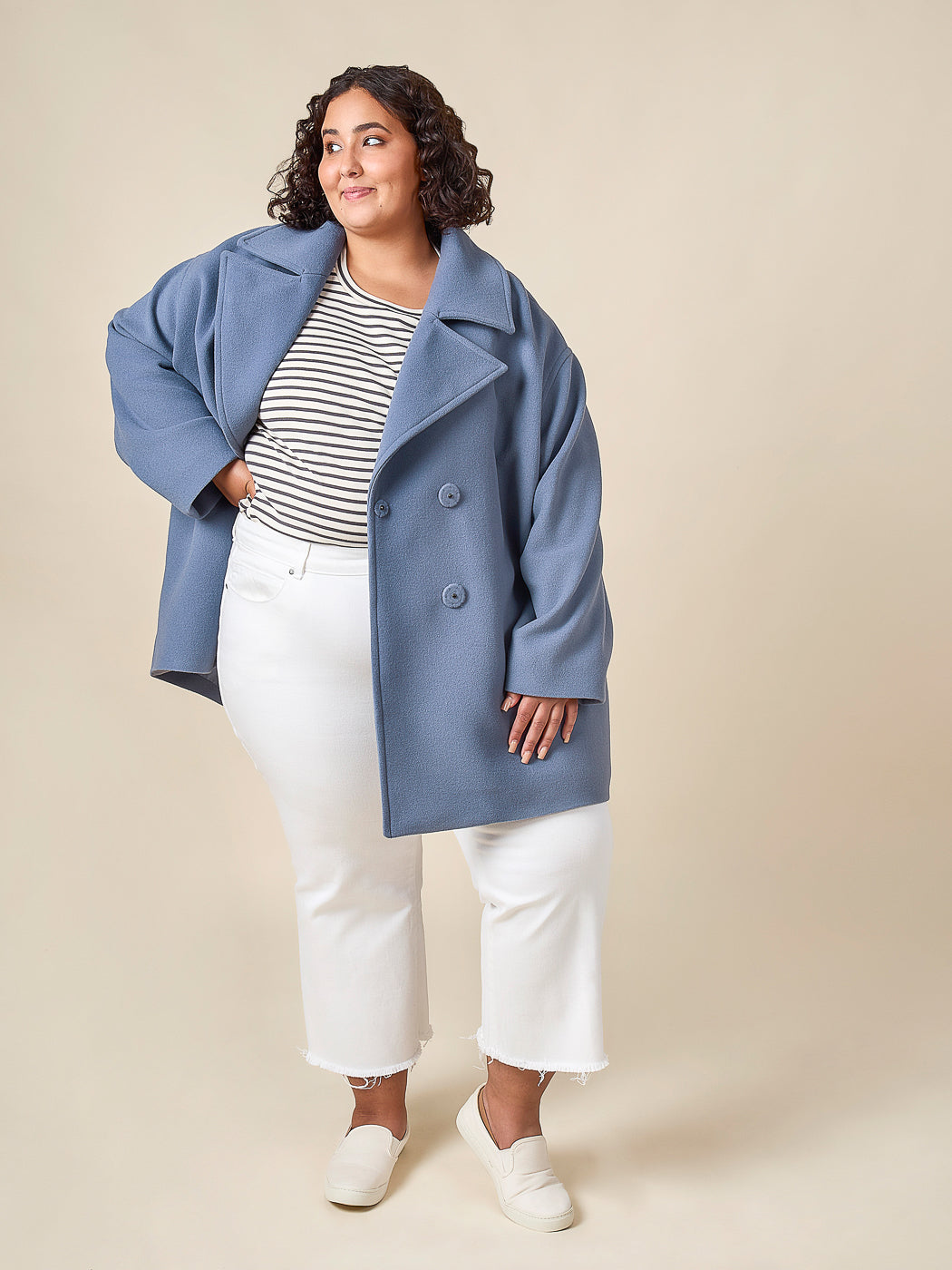 Blue coat held open to show the inside, Closet Core Phoebe Coat PDF sewing pattern