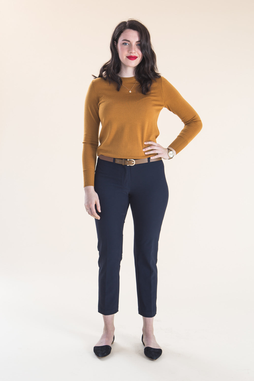 Navy trousers with a mustard top made with the Closet Core Sasha Trousers PDF sewing pattern