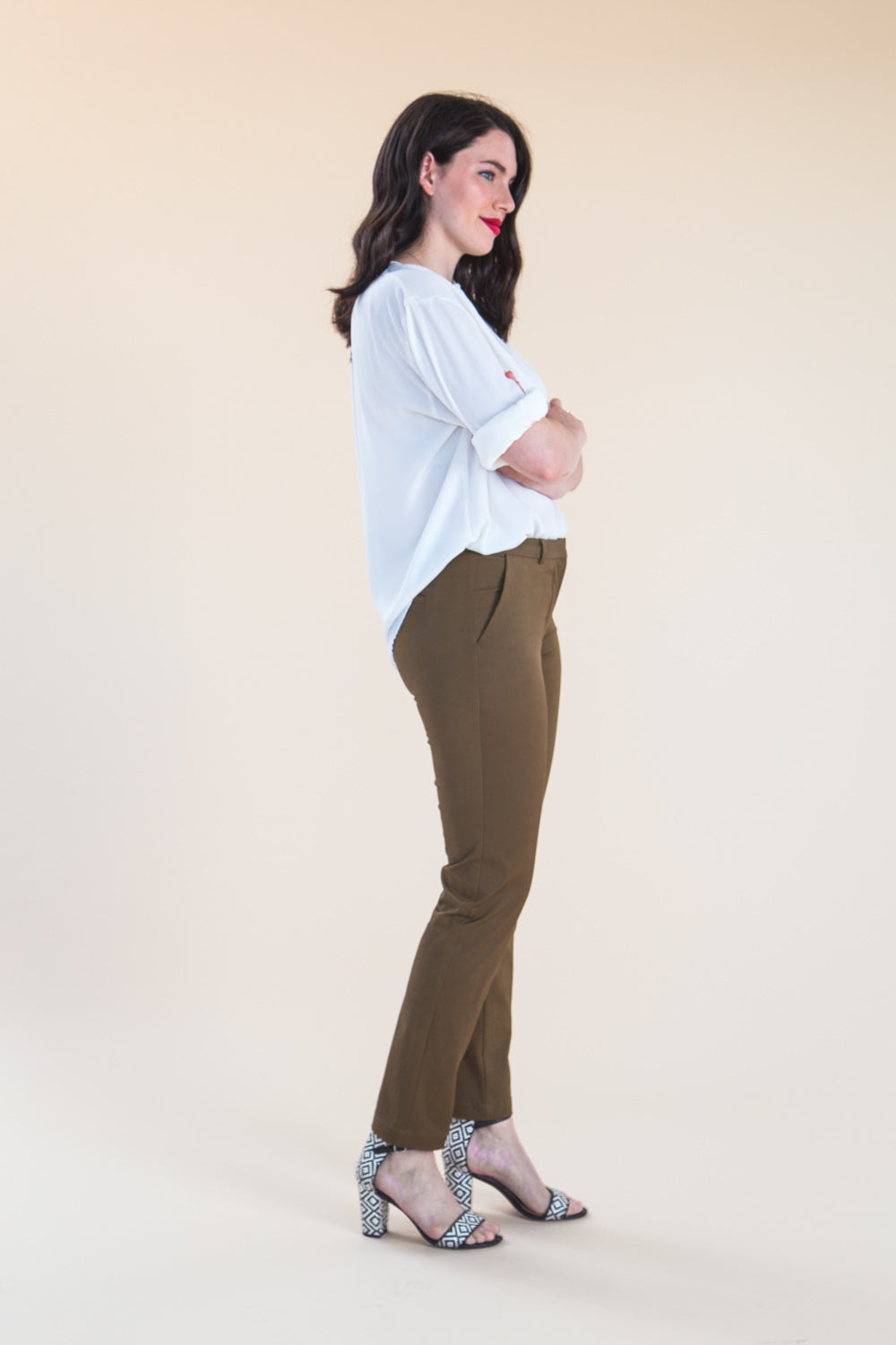 Side view of khaki slim trousers sewn from the Closet Core Sasha Trousers PDF sewing pattern
