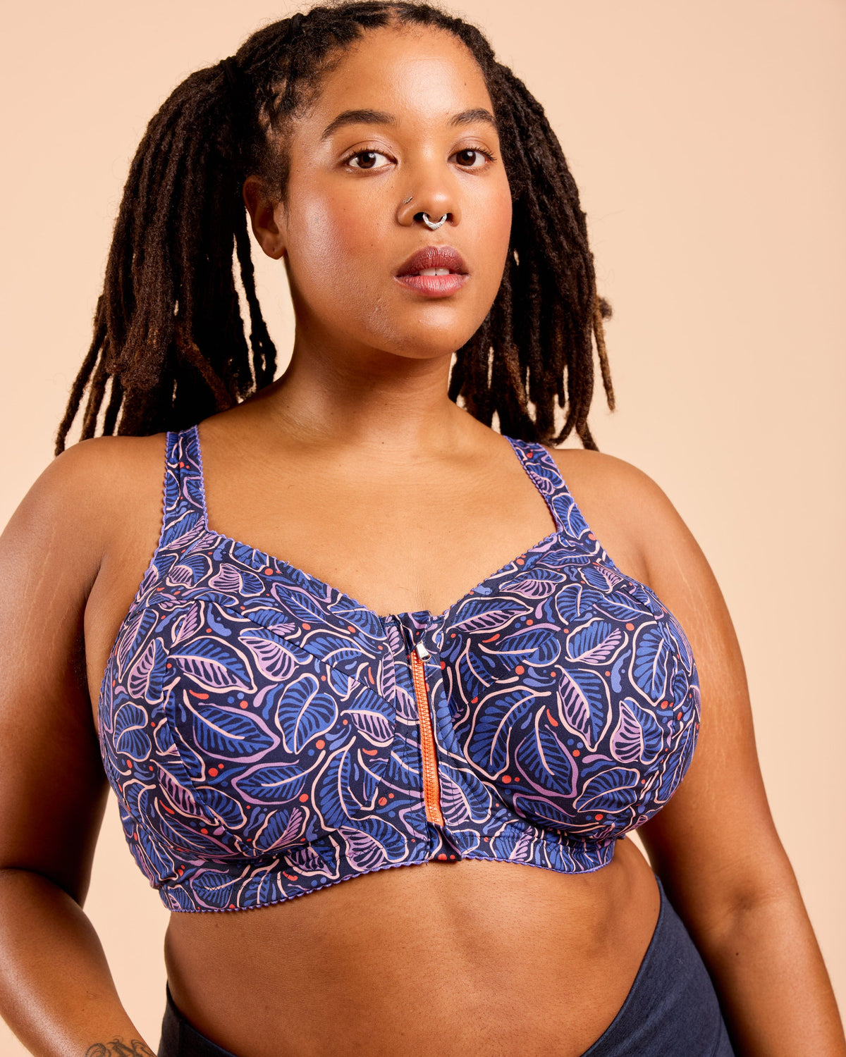 Cashmerette Somerville Sports Bra PDF sewing pattern, woman wearing a blue patterned sports bra