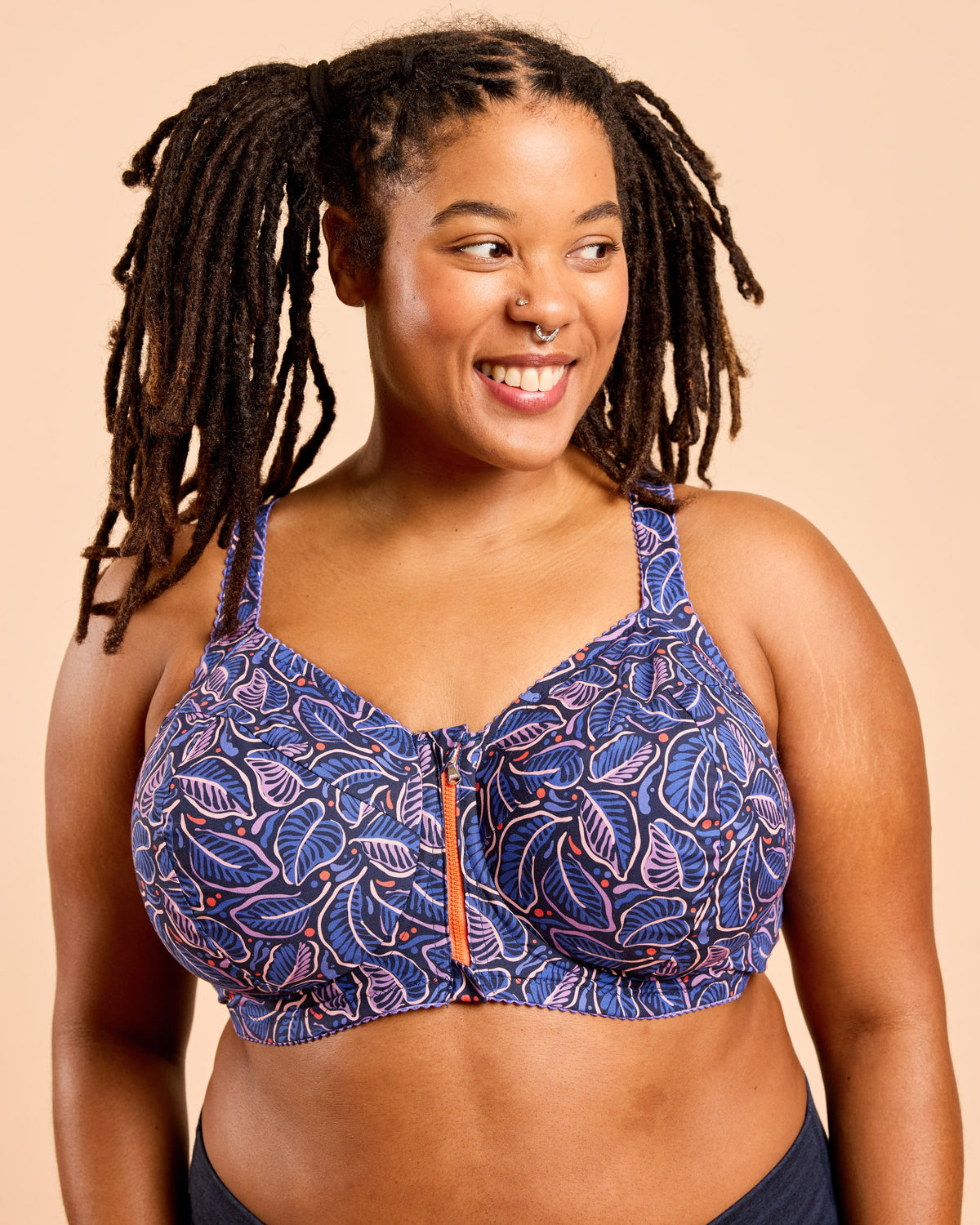 Cashmerette Somerville Sports Bra PDF sewing pattern, woman wearing a blue patterned bra, front view