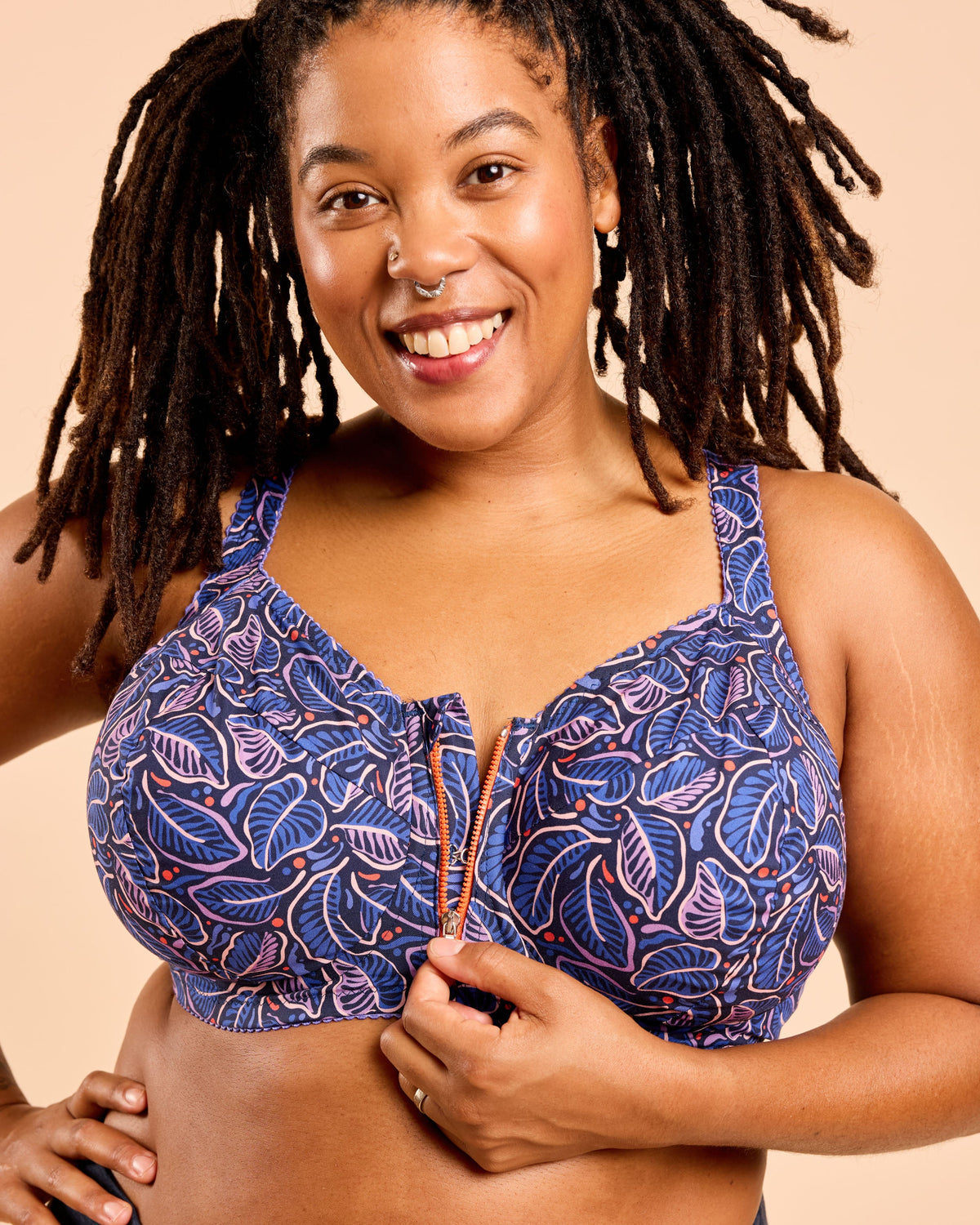 Cashmerette Somerville Sports Bra PDF sewing pattern, woman wearing a blue patterned bra, close-up